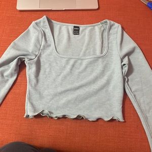 Light blue top